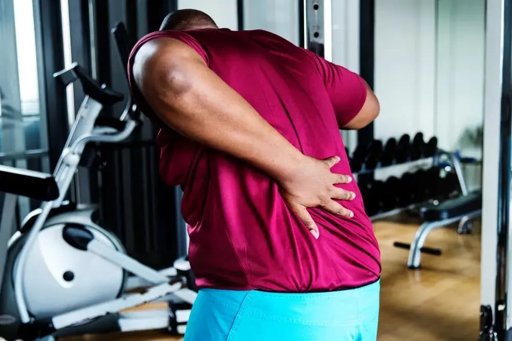 Lower back pain while heavy lifting