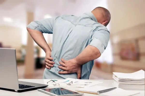 Sharp Pain in Lower Back While Bending or Sitting? Here's Why